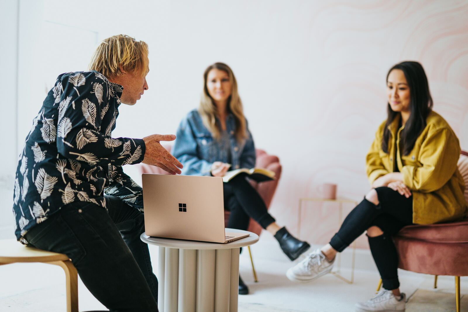 A marketer reviewing creator profiles on a laptop